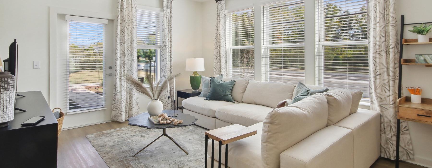 a living room with a couch and a table