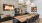 a dining room with a fireplace