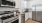 a kitchen with white cabinets