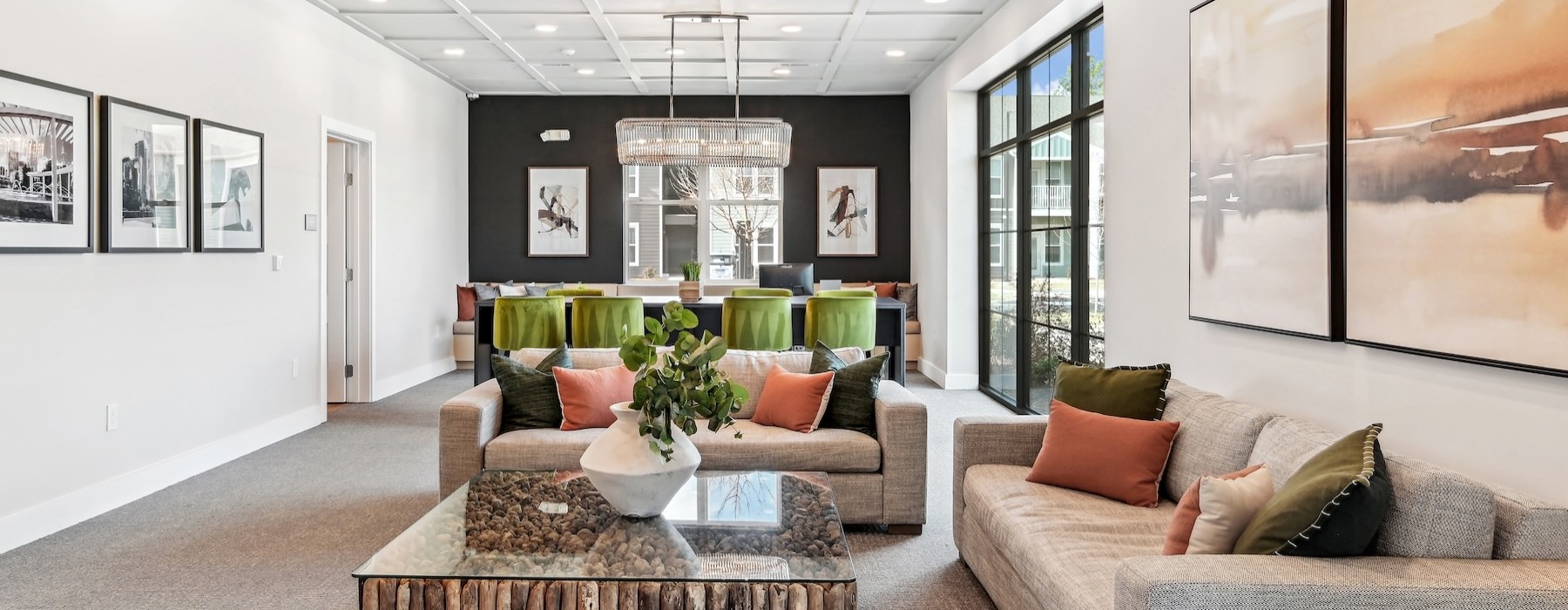 a clubroom with couches and tables