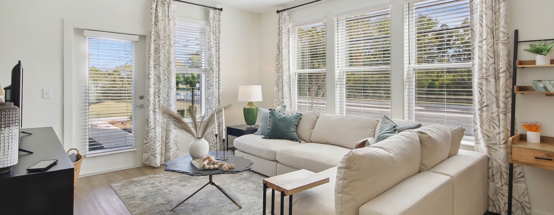 a living room with a couch and a table